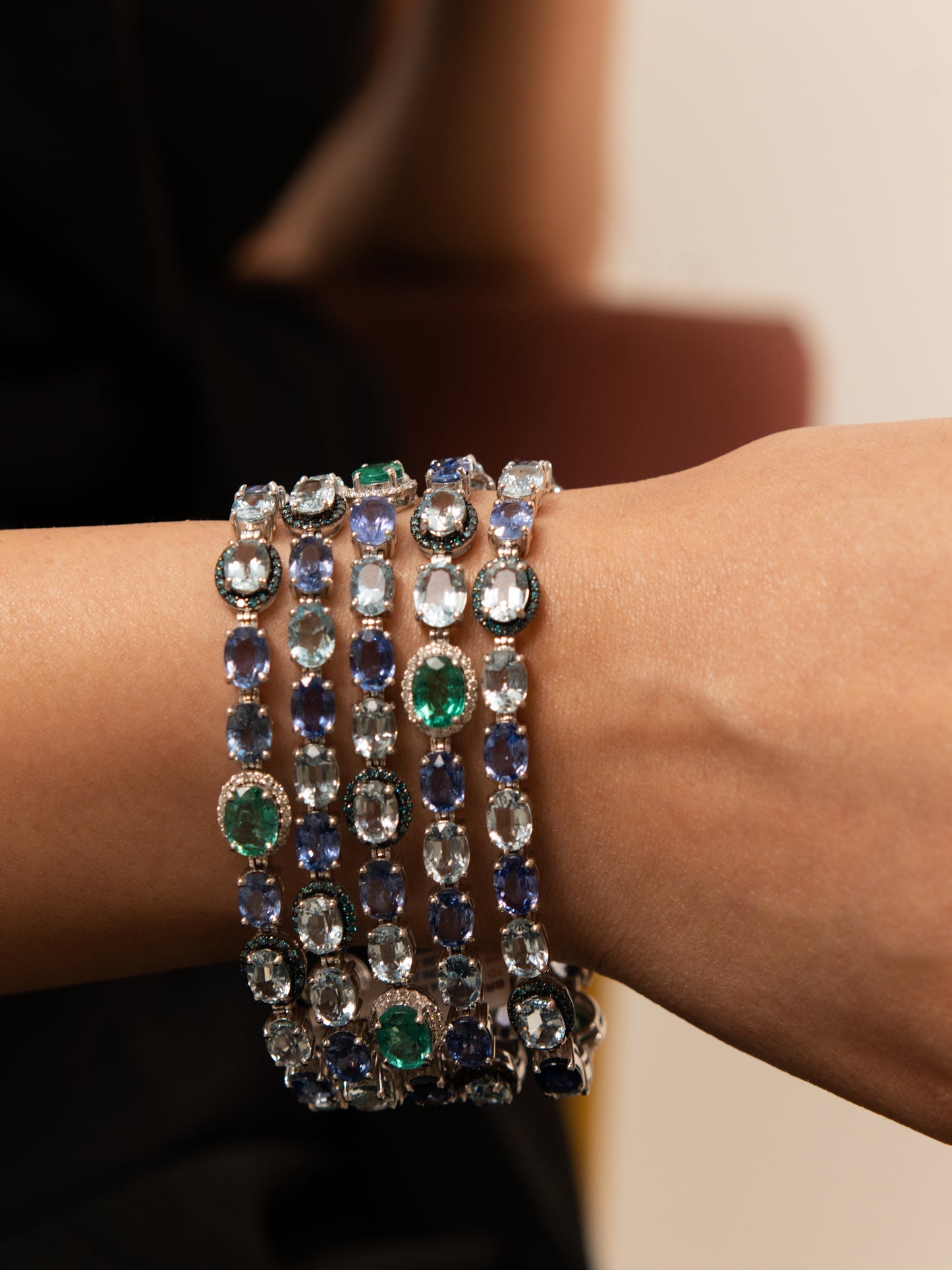 18K Gold Designer 5 row Bracelet featuring Aquamarine, Sapphire and Emerald