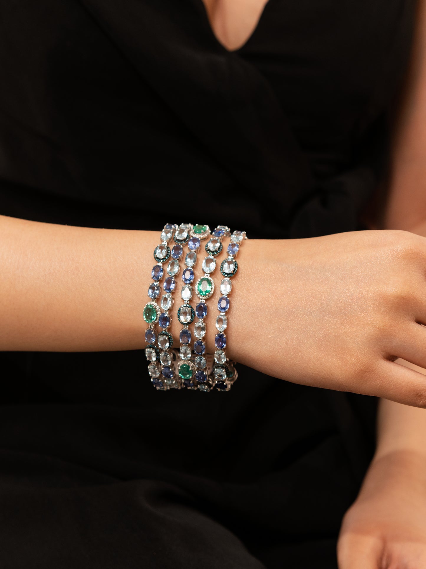 18K Gold Designer 5 row Bracelet featuring Aquamarine, Sapphire and Emerald