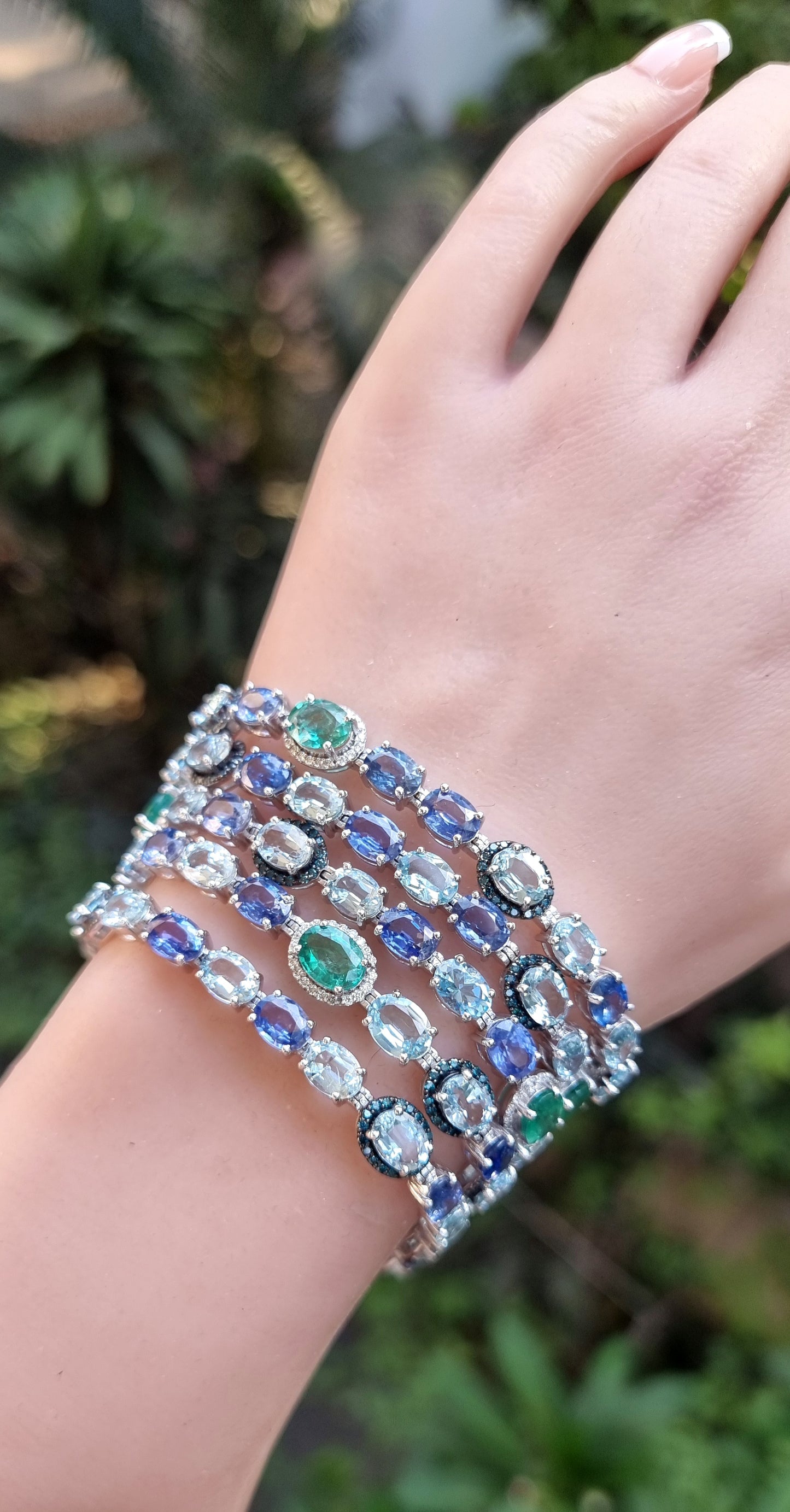 18K Gold Designer 5 row Bracelet featuring Aquamarine, Sapphire and Emerald