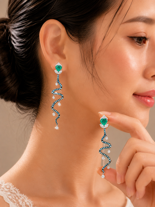 2.58 ct Trillion Emerald with White, Blue, Marquise and Single Drill Diamond Earrings in 18K Gold