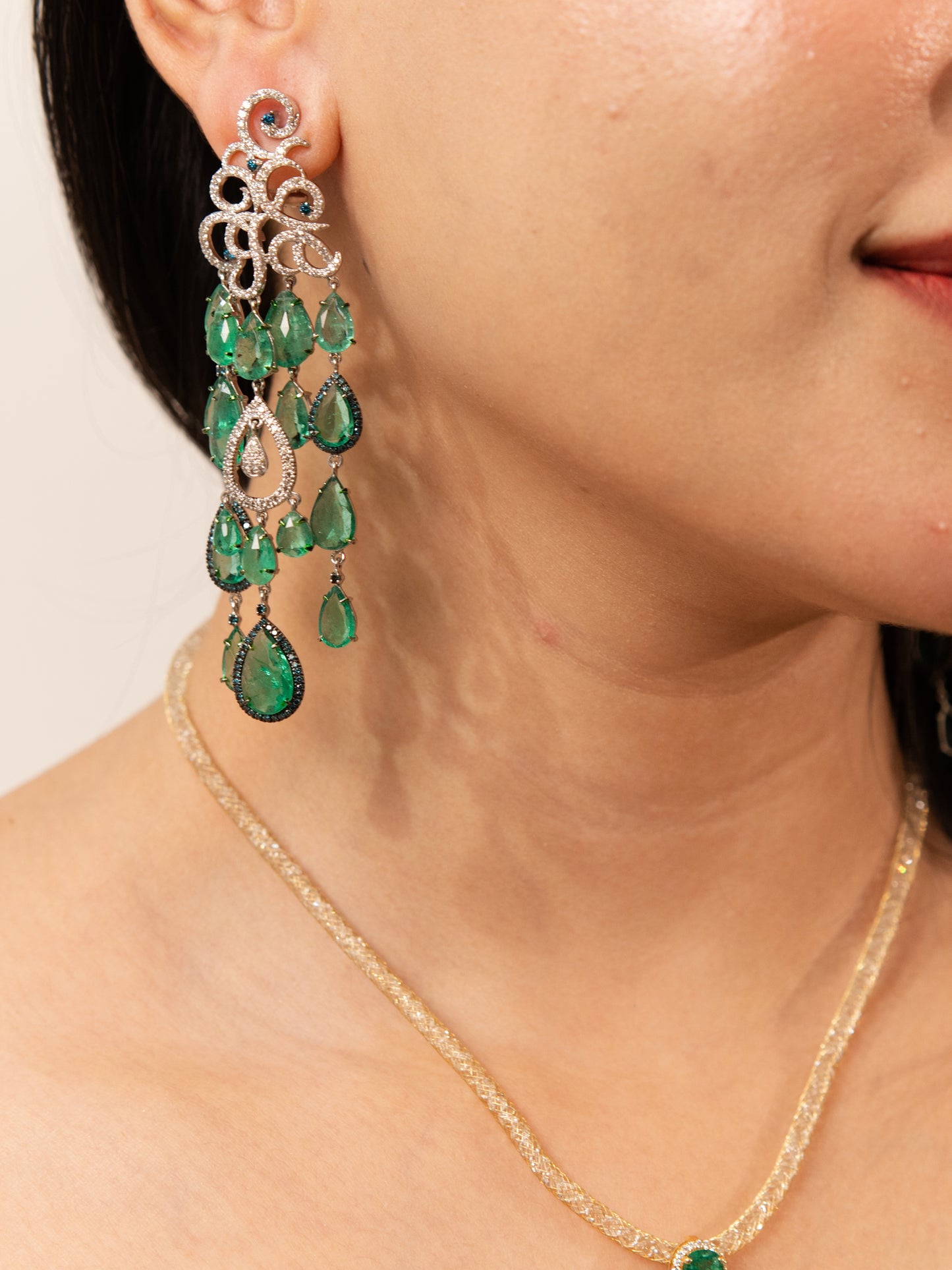 4.00 ct Pear Emerald with White and Blue Diamond Earrings in 18K Gold