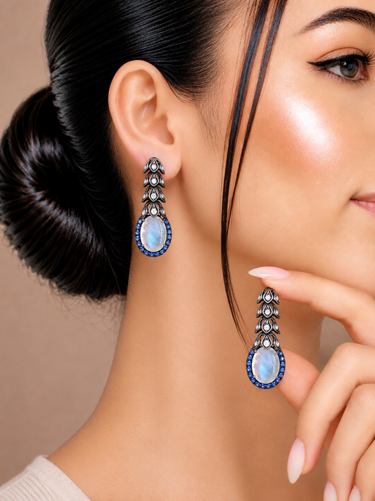 1.37 ct Oval Moonstone with Sapphire and White Diamond Earrings in 14K Gold
