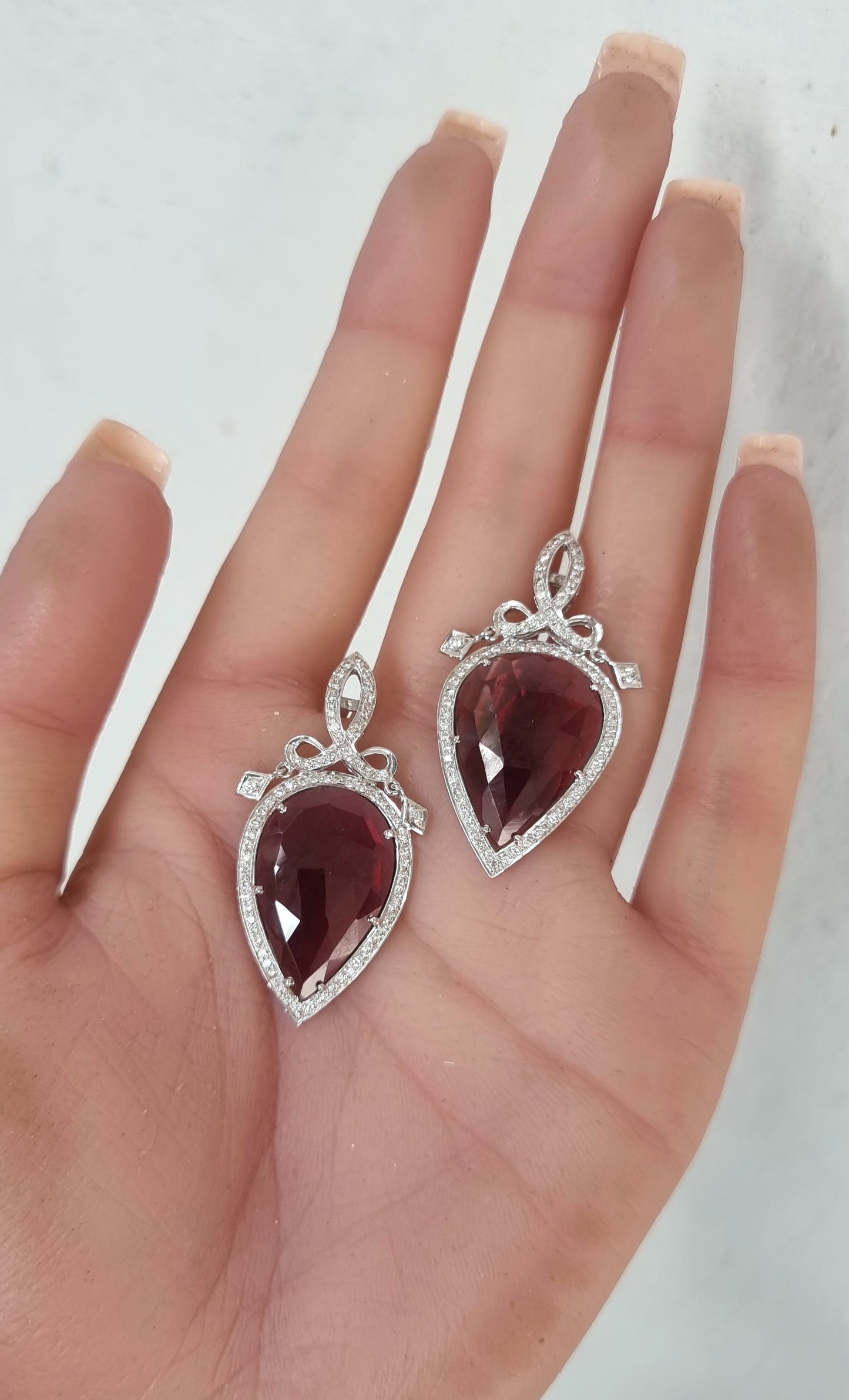 0.61 ct Pear Rhodolite with White Diamond Earrings in 18K Gold