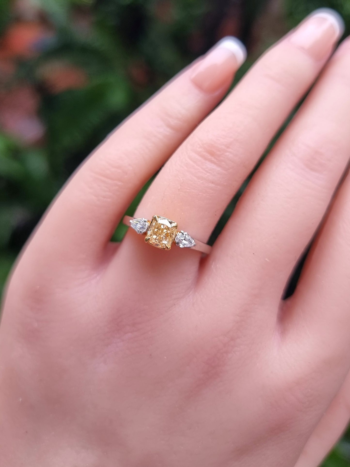 Fancy Yellow Cushion Diamond Ring with Trillion White Diamonds