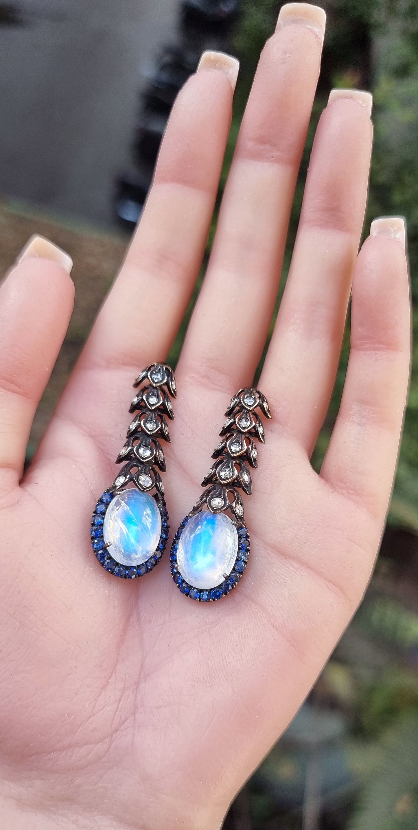 1.37 ct Oval Moonstone with Sapphire and White Diamond Earrings in 14K Gold
