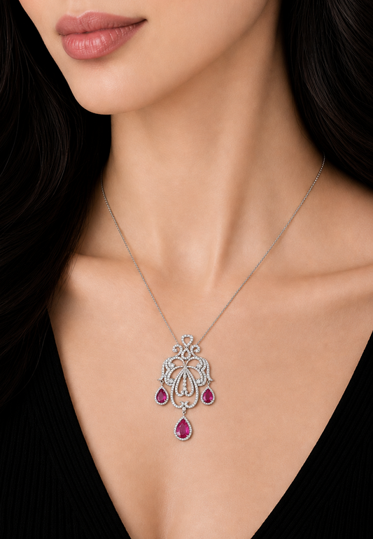 3.53 ct Pear Ruby with White Diamond Pendant in 18K Gold