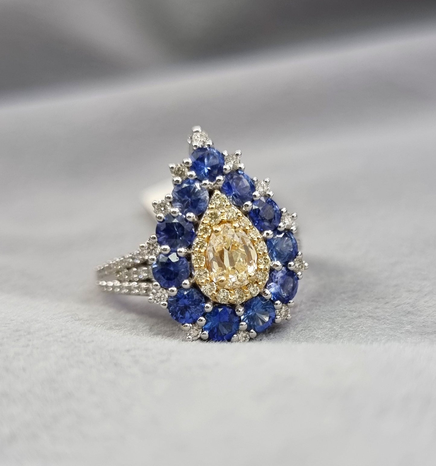 1.17 ct Pear Sapphire with White, Canary and Yellow Diamond Ring in 18K Gold