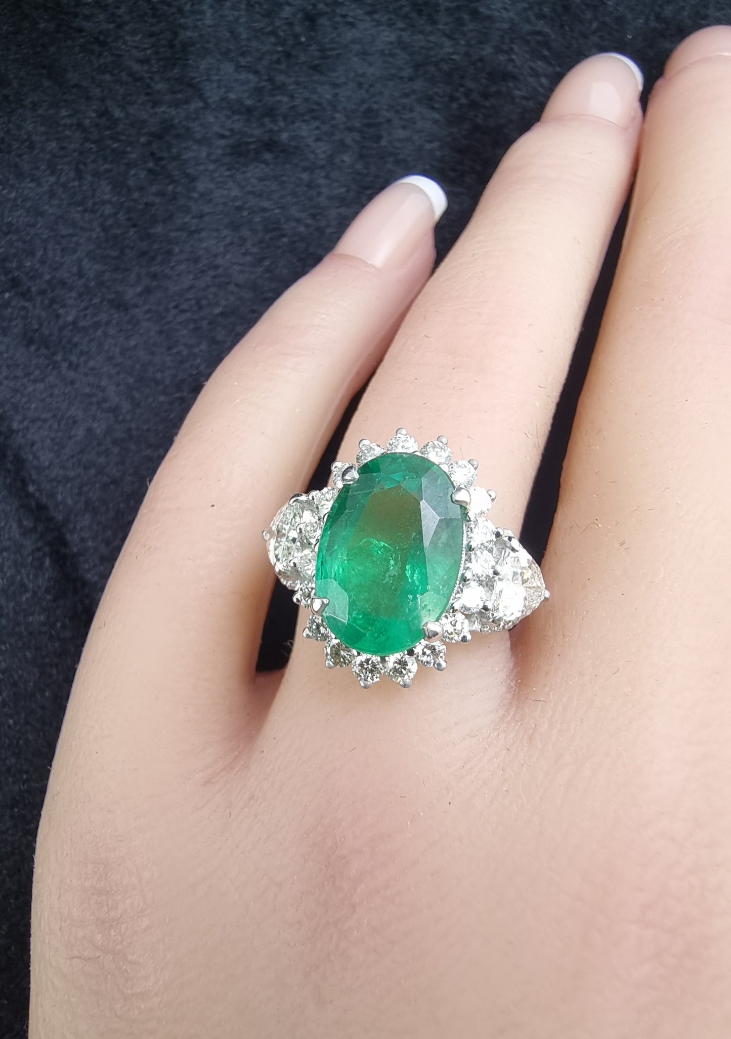 1.63 ct Oval Emerald with White and Trillion Diamond Ring in 18K Gold