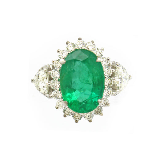 1.63 ct Oval Emerald with White and Trillion Diamond Ring in 18K Gold