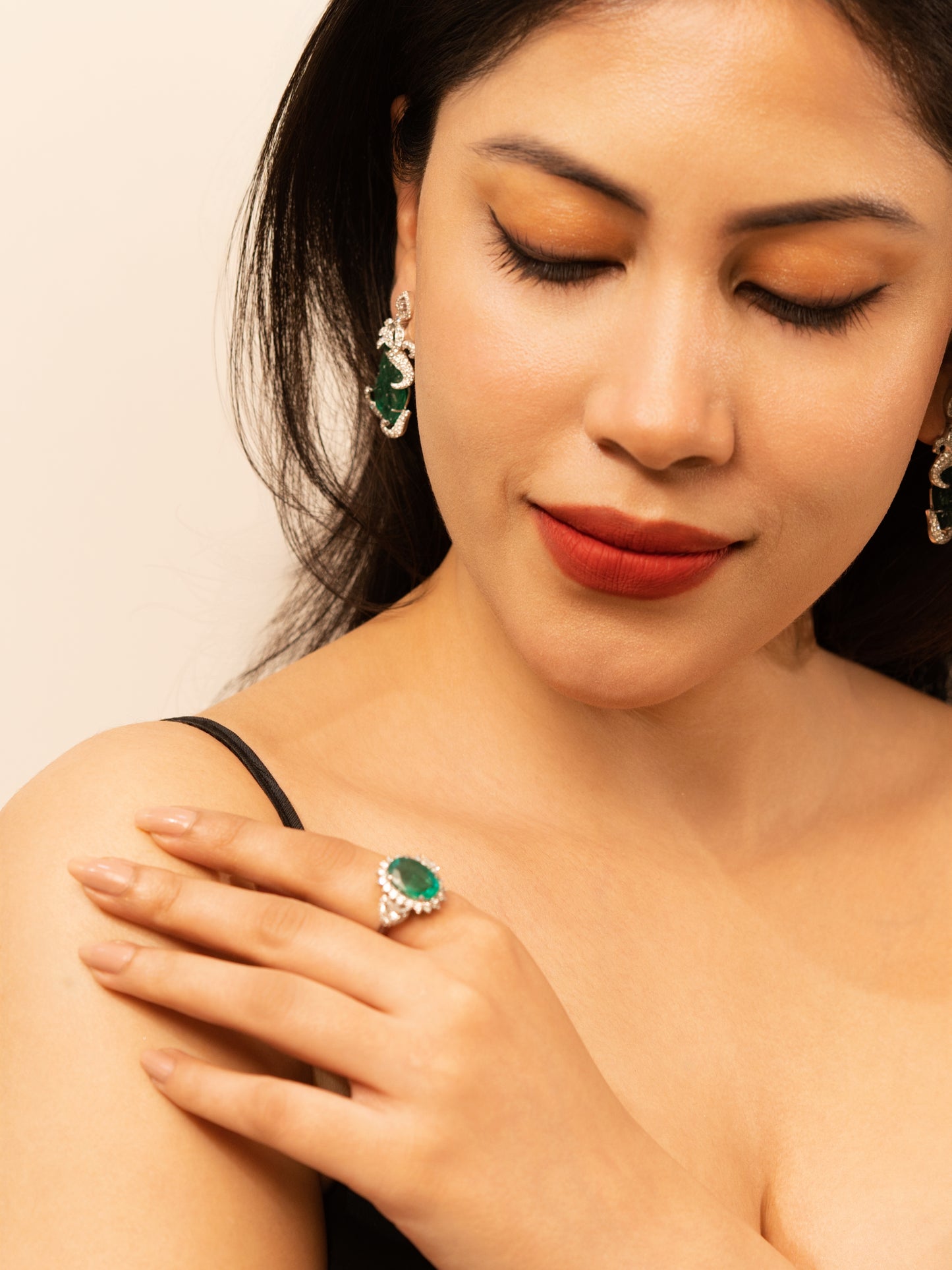 1.63 ct Oval Emerald with White and Trillion Diamond Ring in 18K Gold