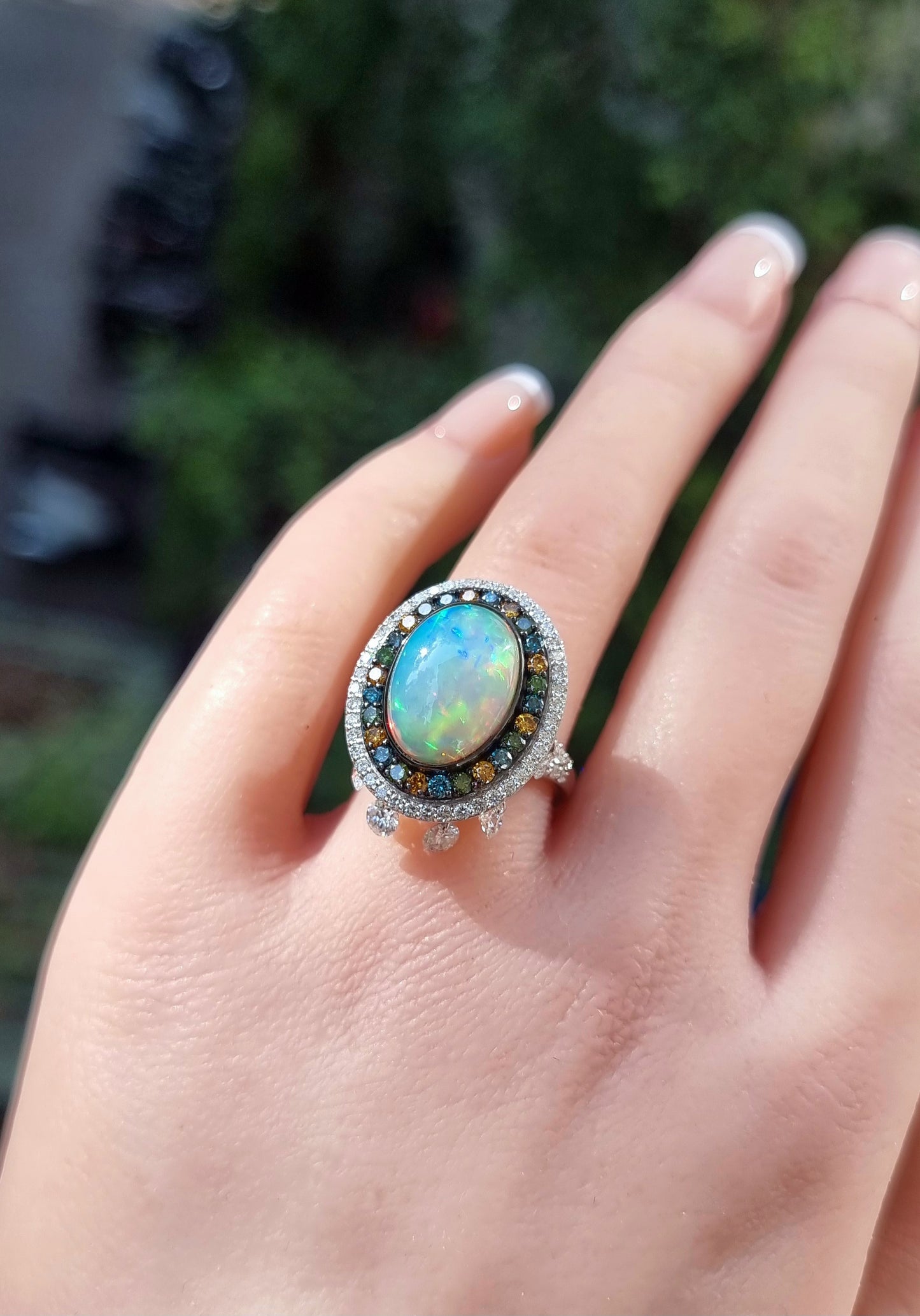 2.48 ct Oval Opal with White, Blue and Brunt Orange Diamond Ring in 18K Gold