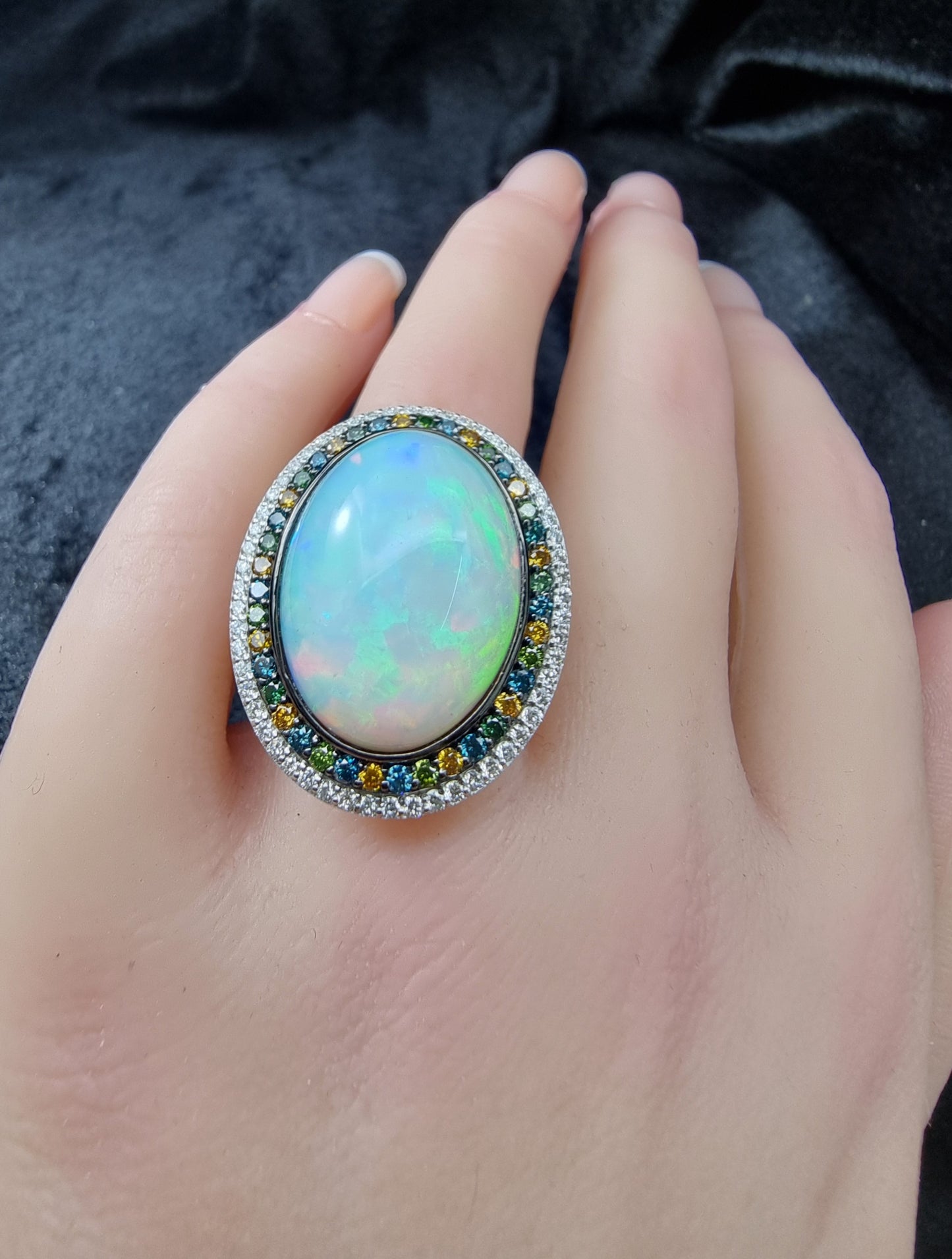 1.44 ct Oval Opal with White Blue and Brunt Orange Diamond Ring in 18K Gold