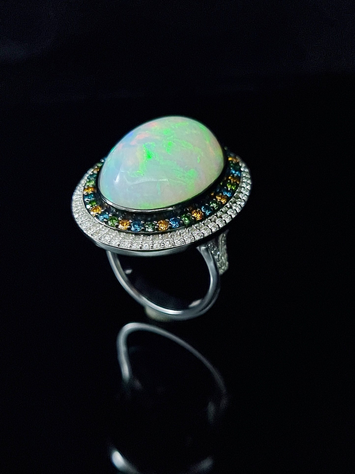 1.44 ct Oval Opal with White Blue and Brunt Orange Diamond Ring in 18K Gold