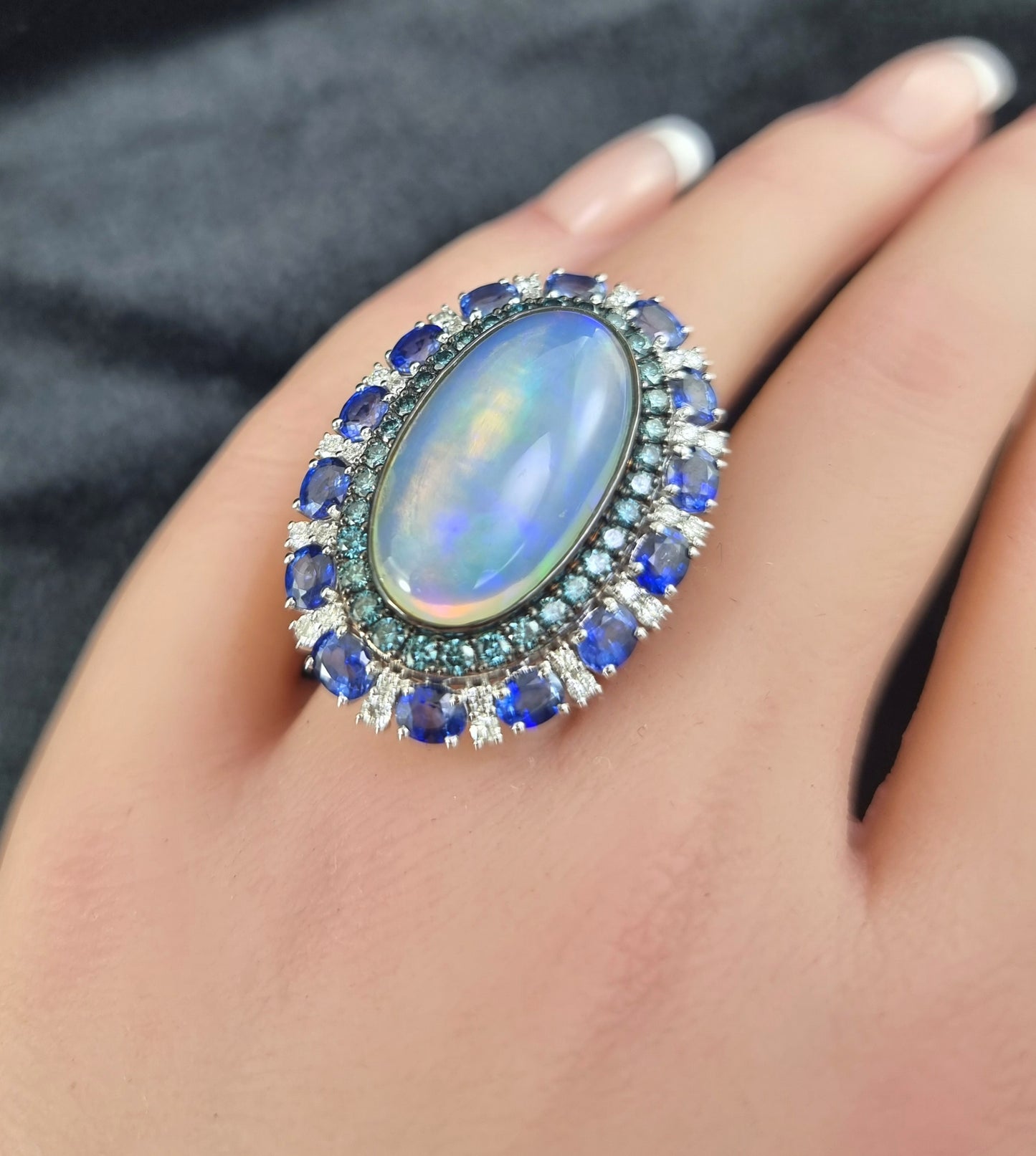 1.74 ct Oval Opal with Sapphire and White Blue Diamond Ring in 18K Gold