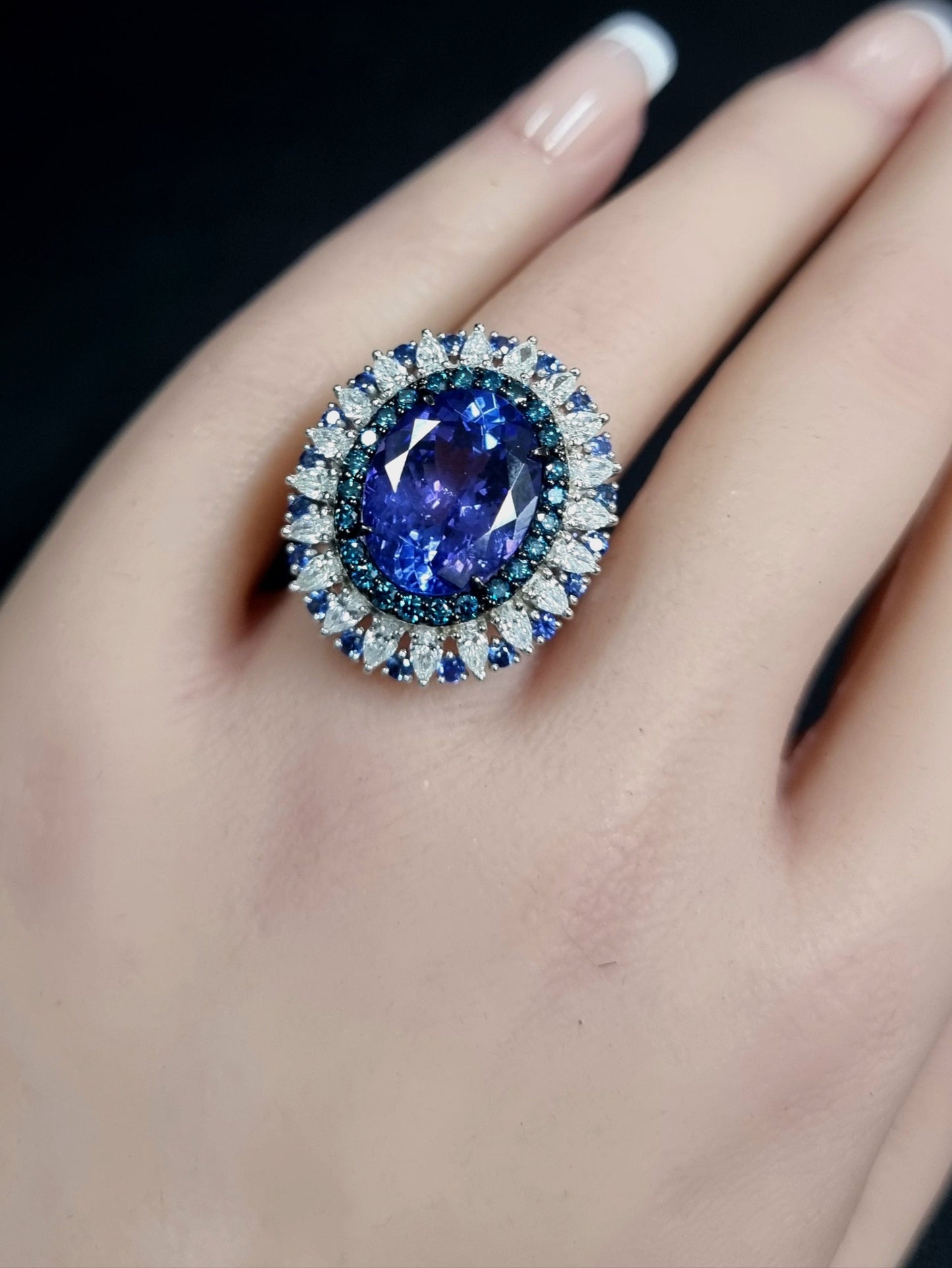 Oval Tanzanite & Diamond Halo Ring