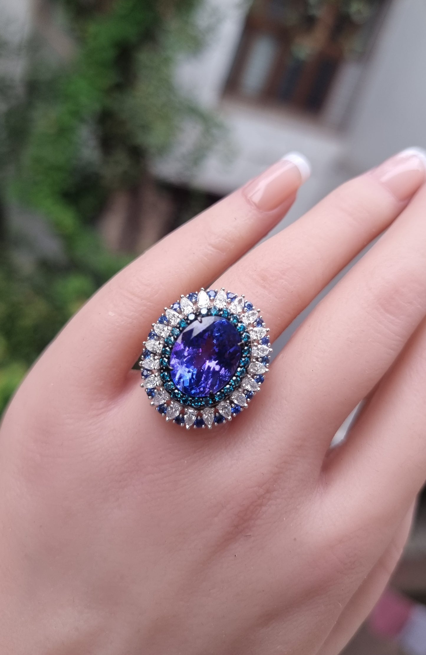 Oval Tanzanite & Diamond Halo Ring