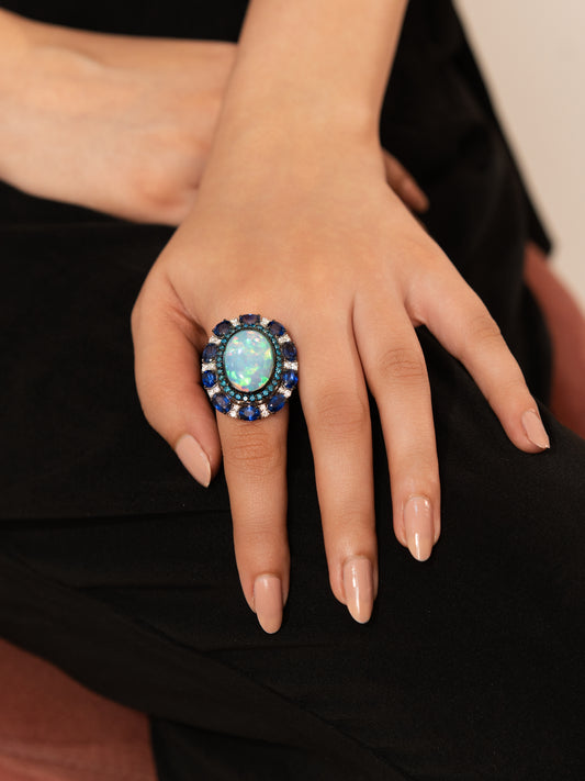 Vintage 18K Opal Ring with Blue Diamond Halo & Sapphire Accents