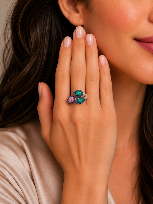 0.14 ct Oval Emerald with Sapphire and White Diamond Ring in 18K Gold