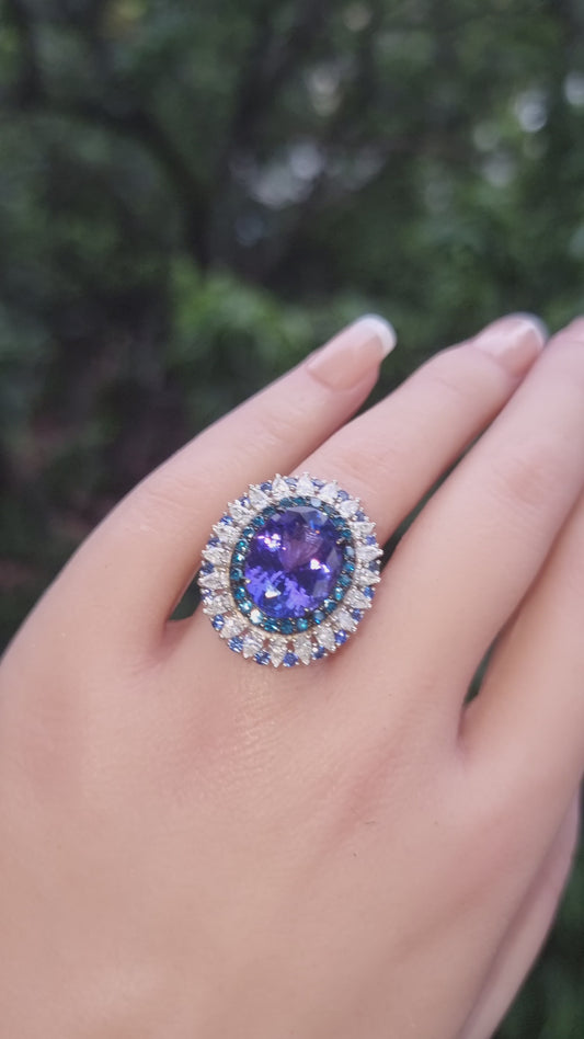 Oval Tanzanite & Diamond Halo Ring