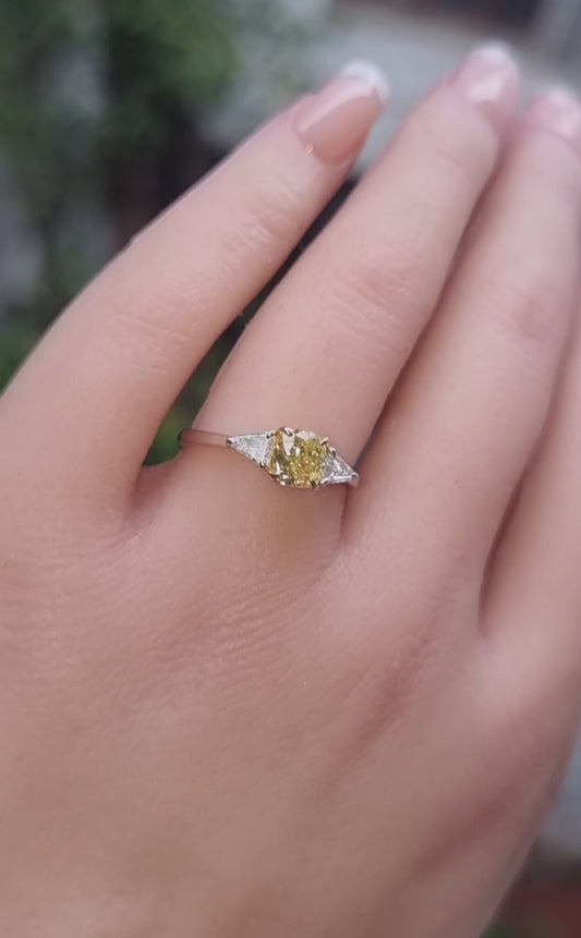 Fancy Yellow Cushion Diamond Ring with Trillion White Diamonds
